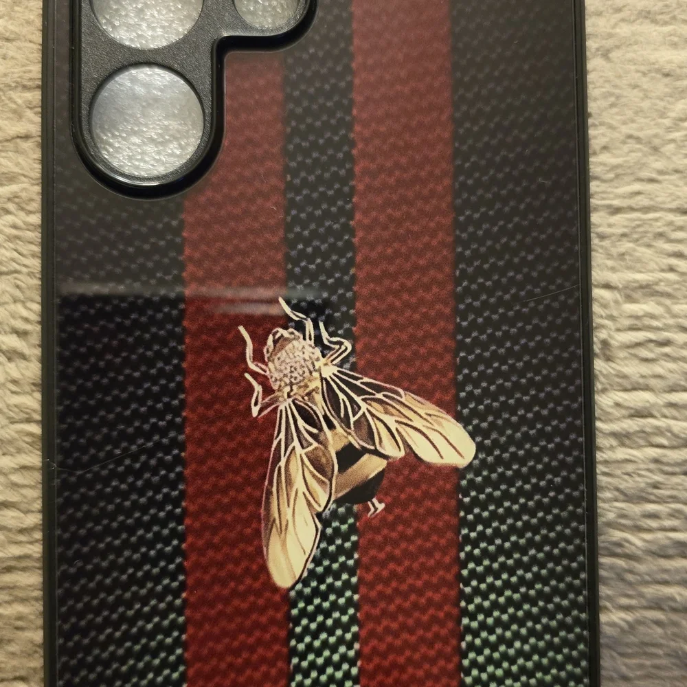 Luxury Black and Green Phone Case with Gold Accent